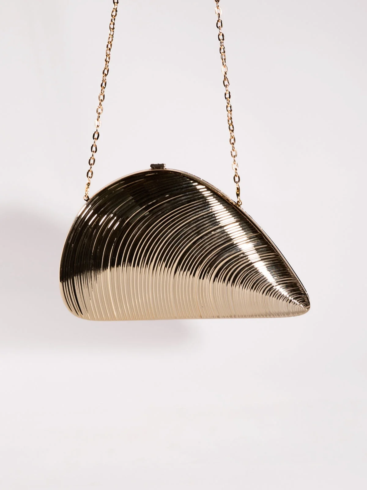 Champagne Seashell Convertible Clutch for Elegant Versatility
