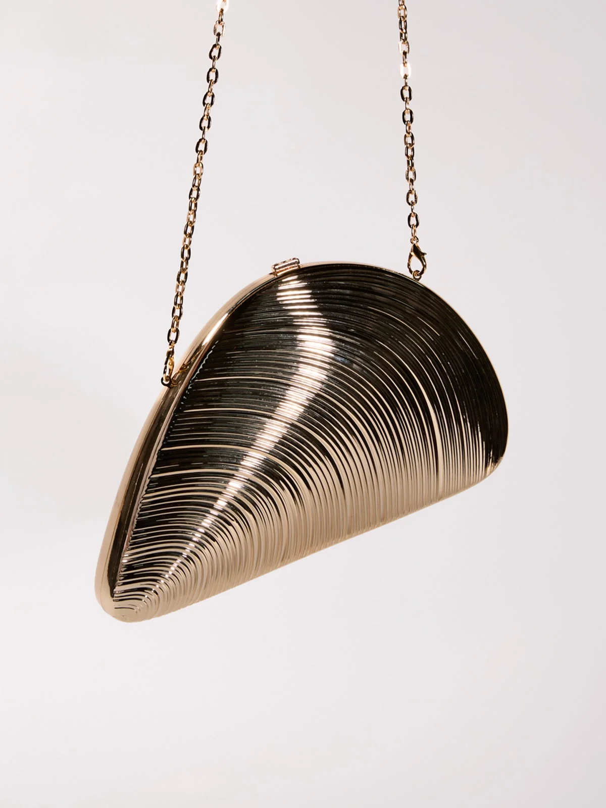 Champagne Seashell Convertible Clutch for Elegant Versatility