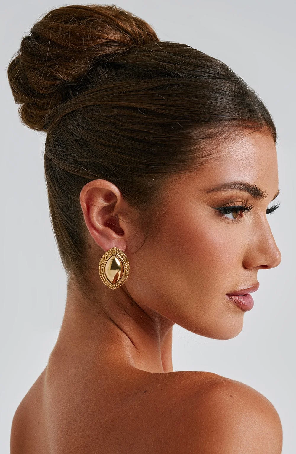 Gold Ellipse Earrings - Stylish Metal Studs
