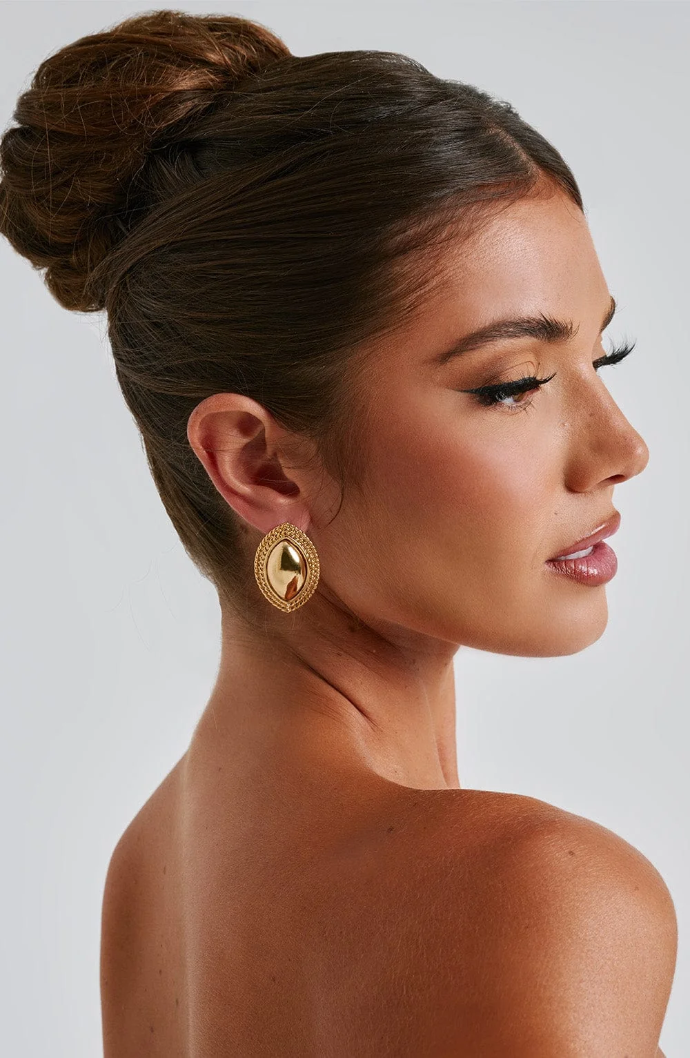 Gold Ellipse Earrings - Stylish Metal Studs