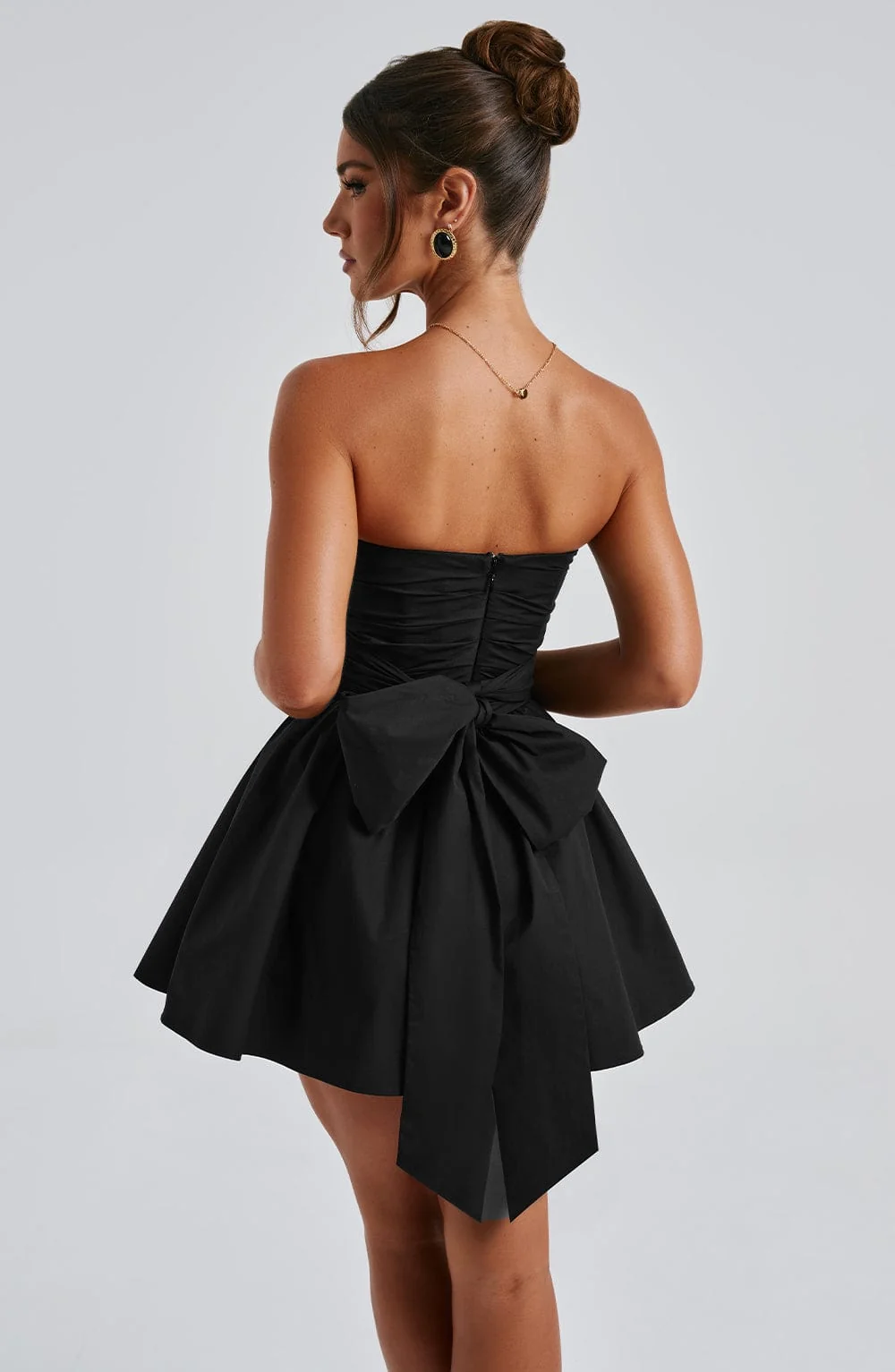 Black Strapless Voluminous Mini Dress with Waist Cinching Bow Detail