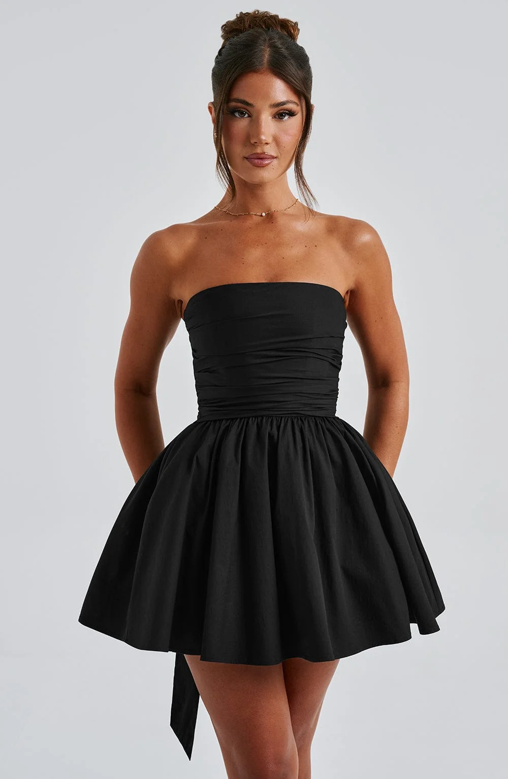 Black Strapless Voluminous Mini Dress with Waist Cinching Bow Detail