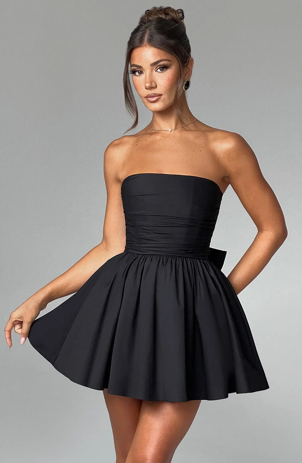Black Strapless Voluminous Mini Dress with Waist Cinching Bow Detail