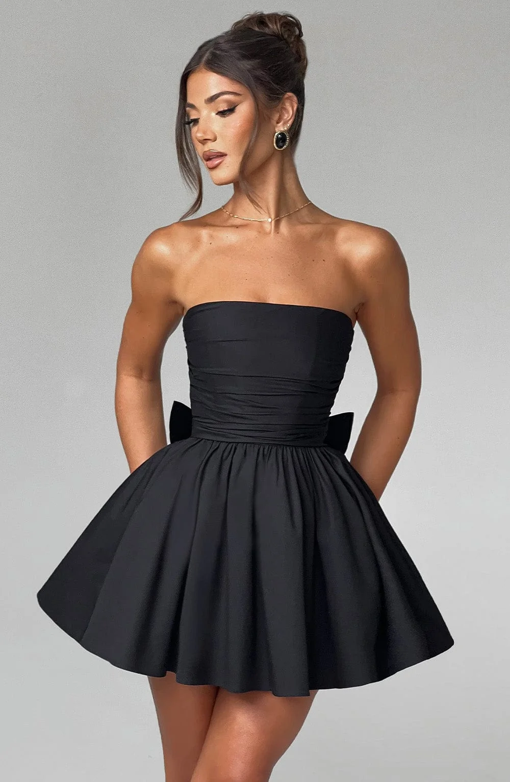 Black Strapless Voluminous Mini Dress with Waist Cinching Bow Detail