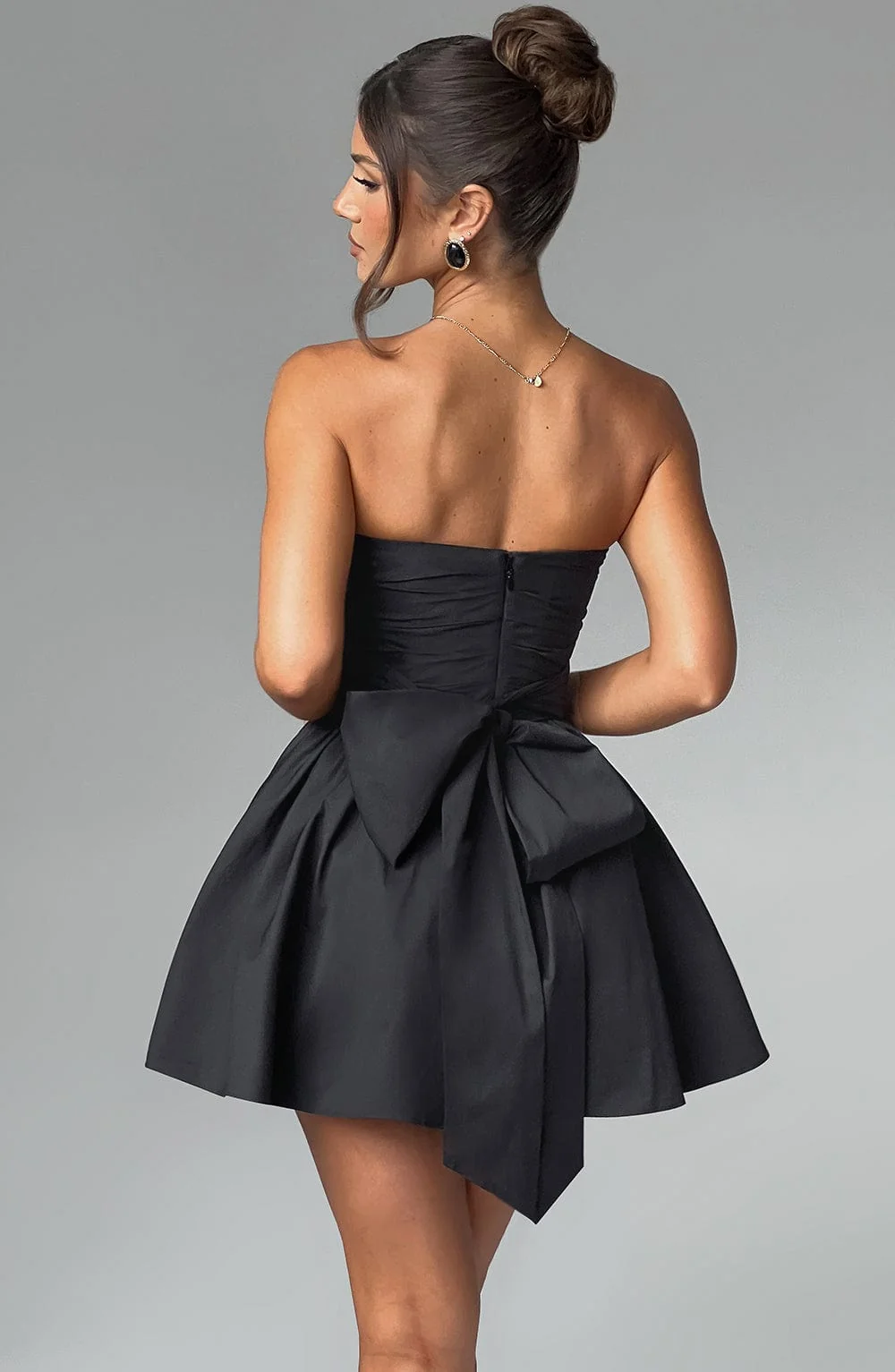 Black Strapless Voluminous Mini Dress with Waist Cinching Bow Detail