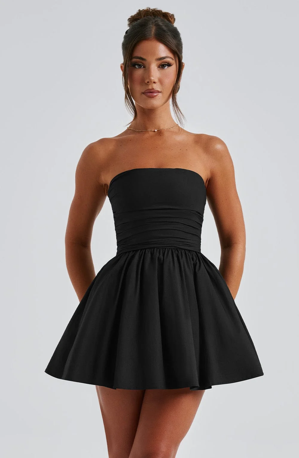 Black Strapless Voluminous Mini Dress with Waist Cinching Bow Detail