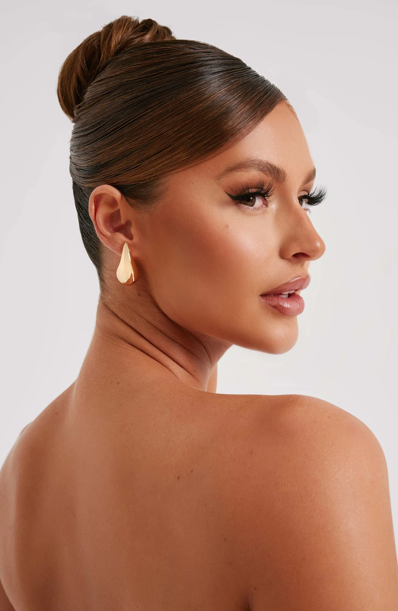 Gold Drop Shape Earrings with Stud Fastening