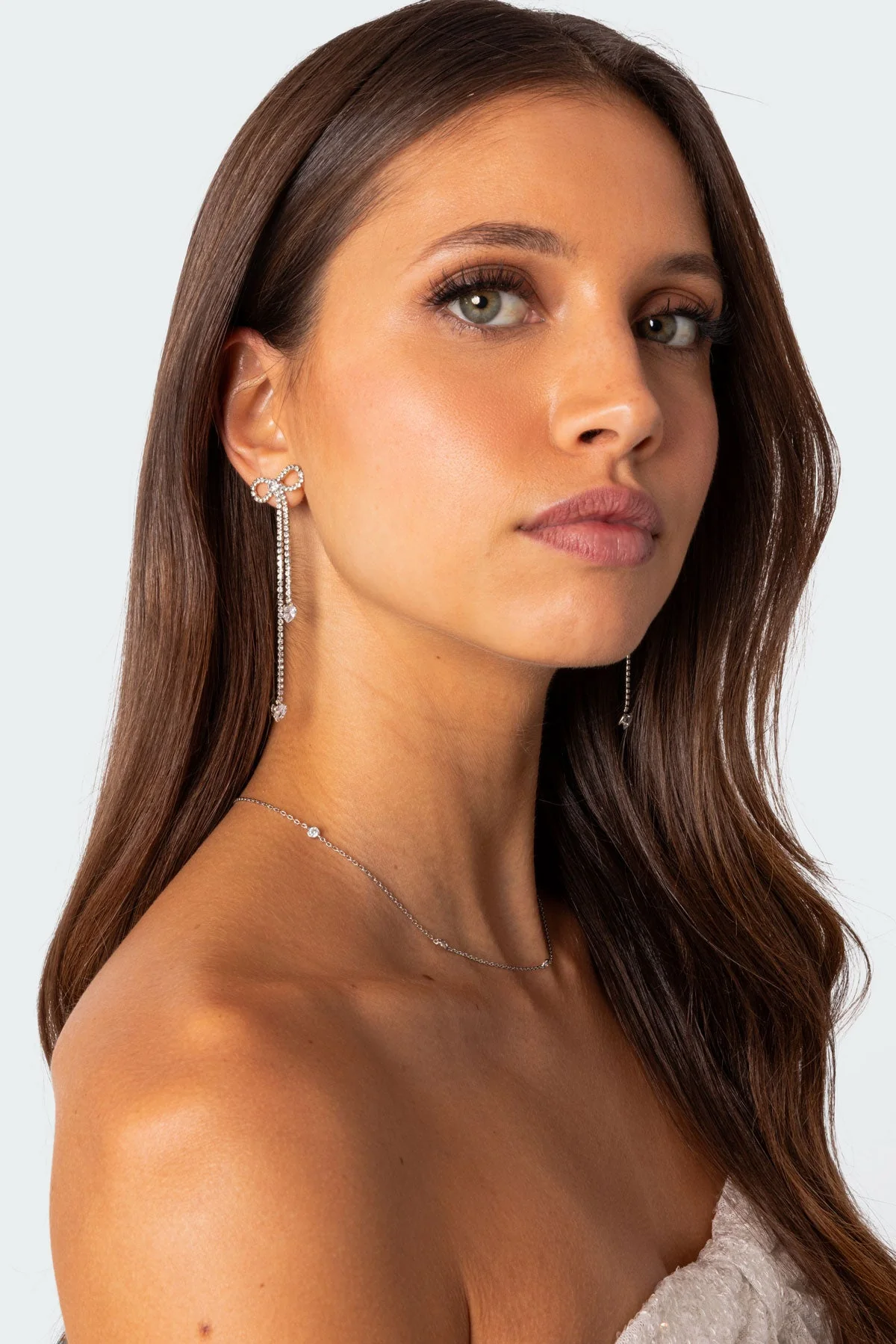 Silver Rhinestone Dangle Bow Earrings