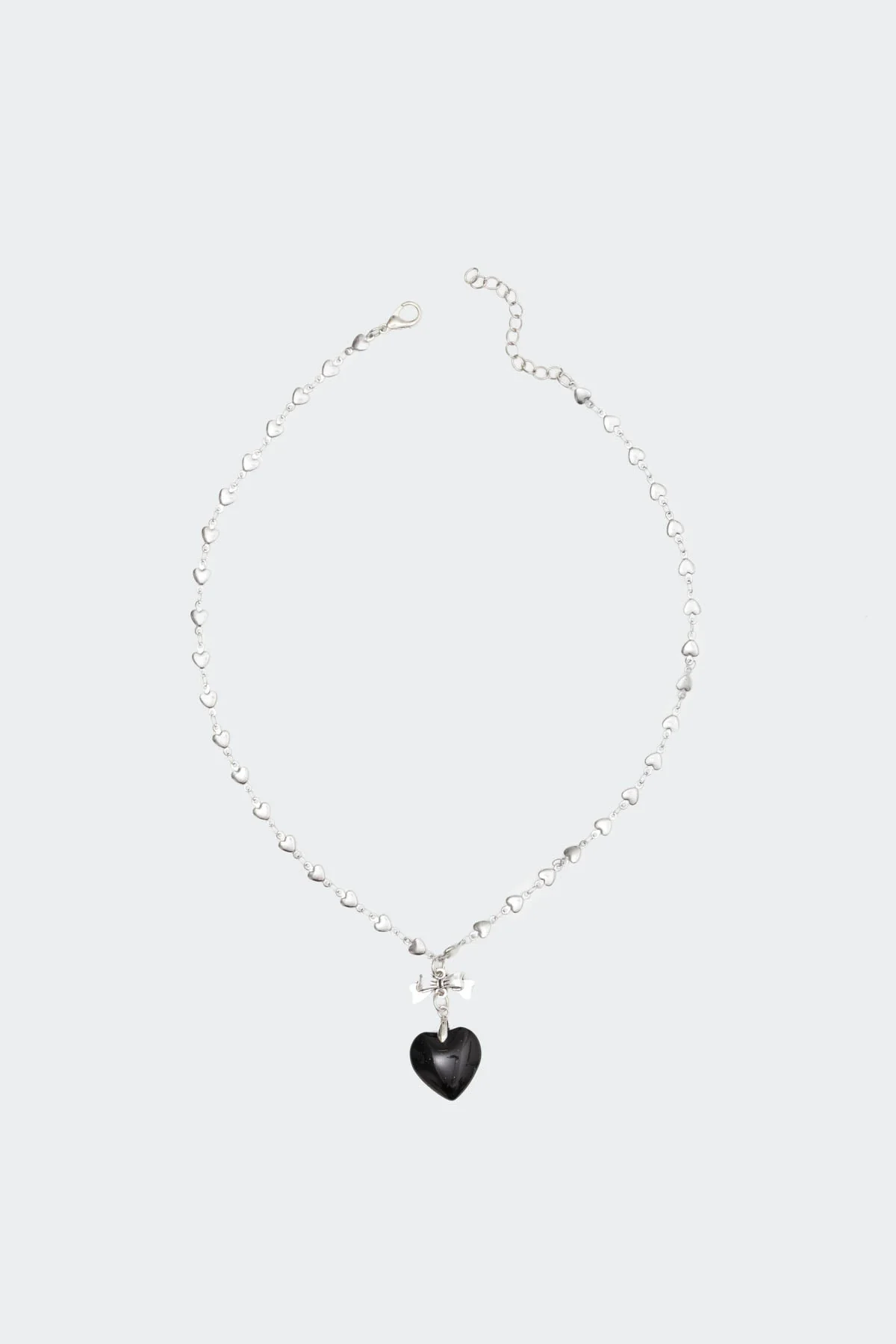 Heart Pendant Bow Necklace in Silver Tone Metal