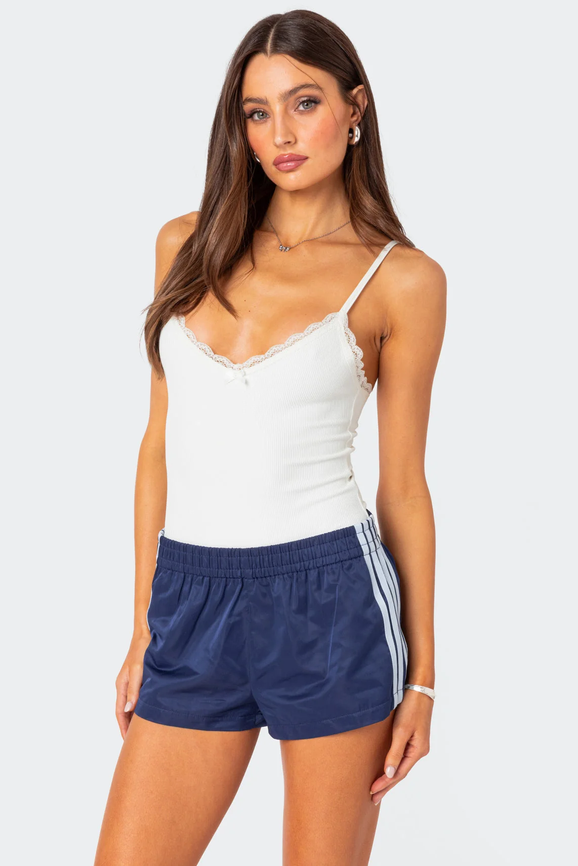 Ribbed White Bodysuit with Lace Trim & Adjustable Straps