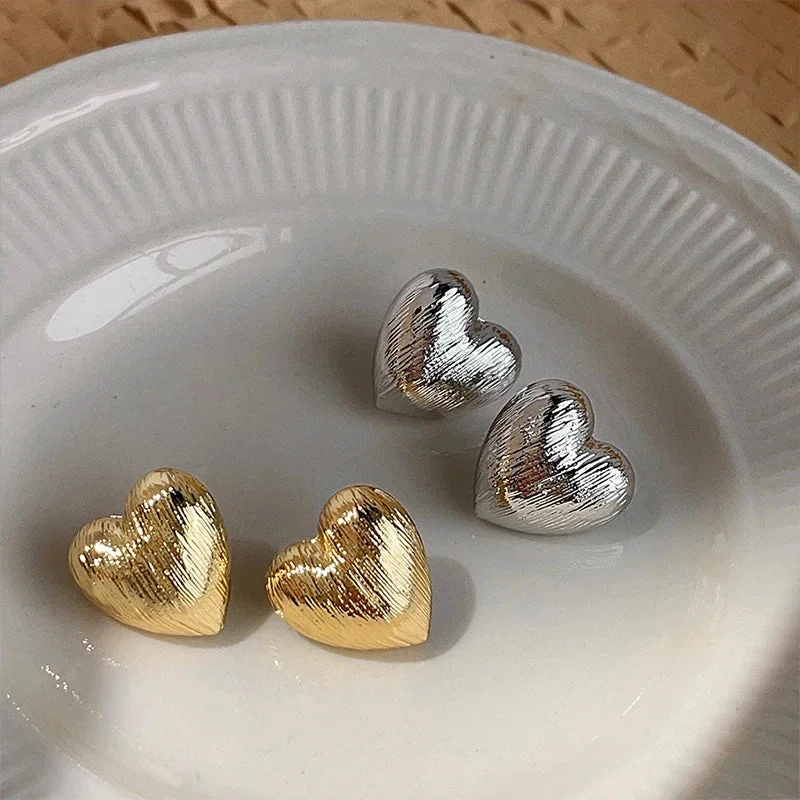 Elegant Aurora Heart Stud Earrings in Gold & Silver