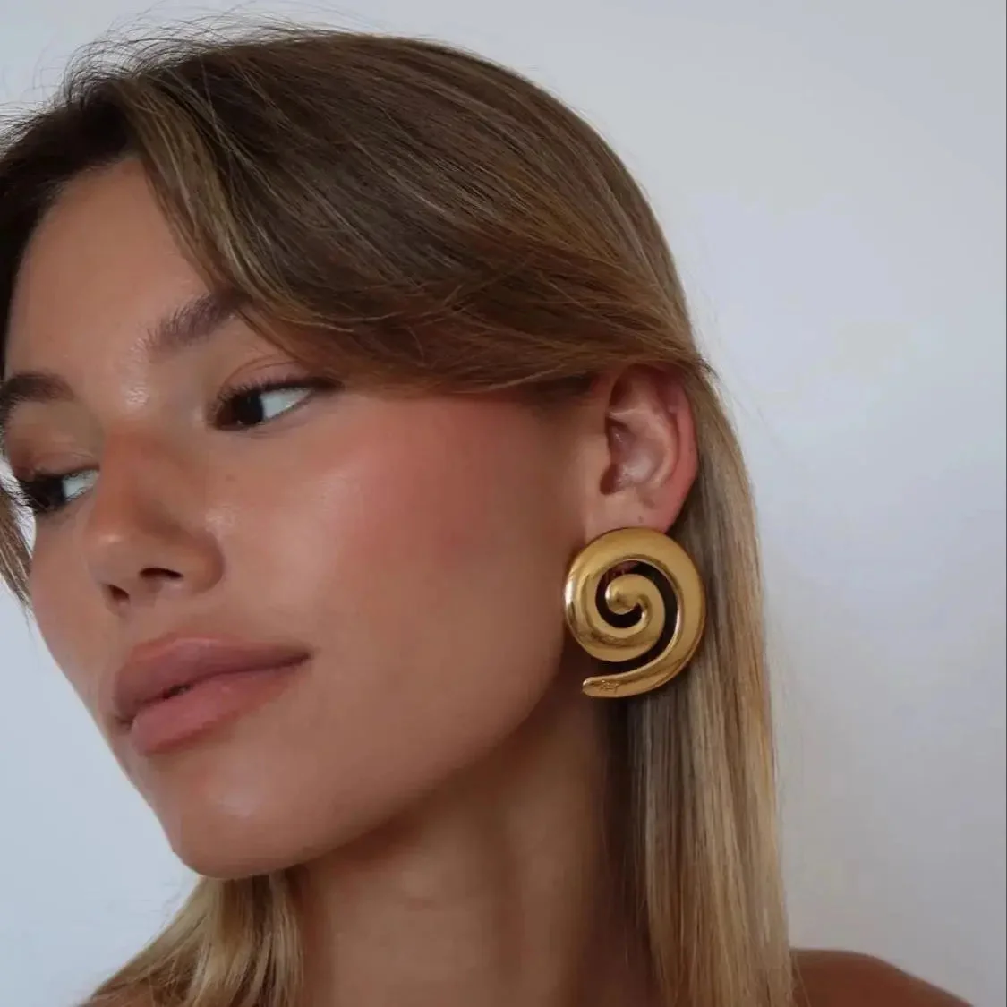 Spiral Gold Statement Earrings - Artistic Polished Design