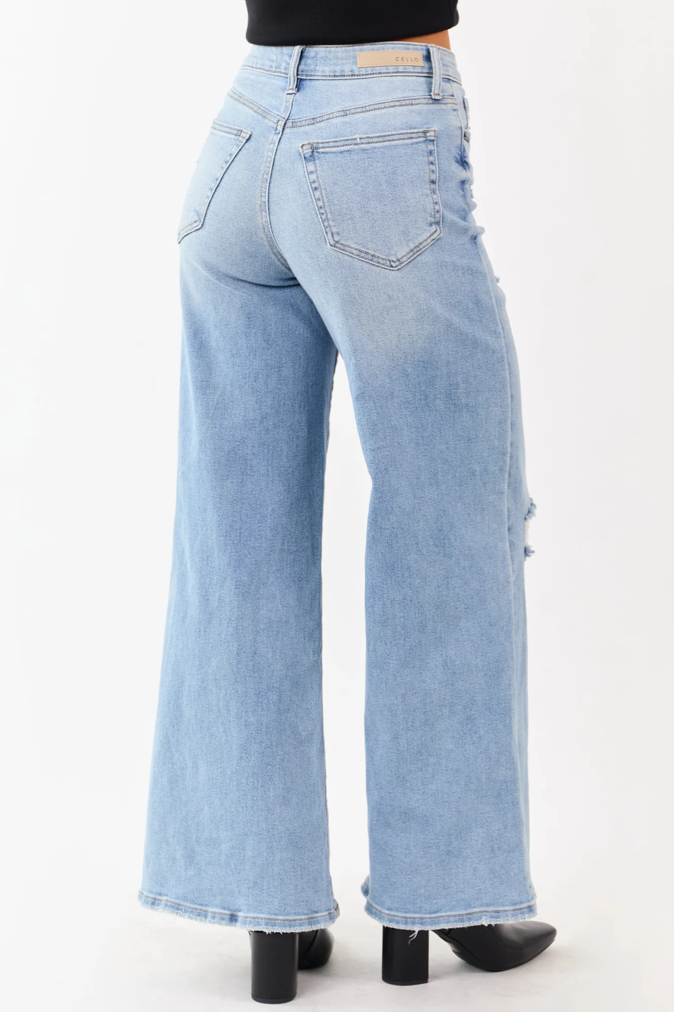 Distressed High Rise Wide Leg Light Wash Denim Jeans