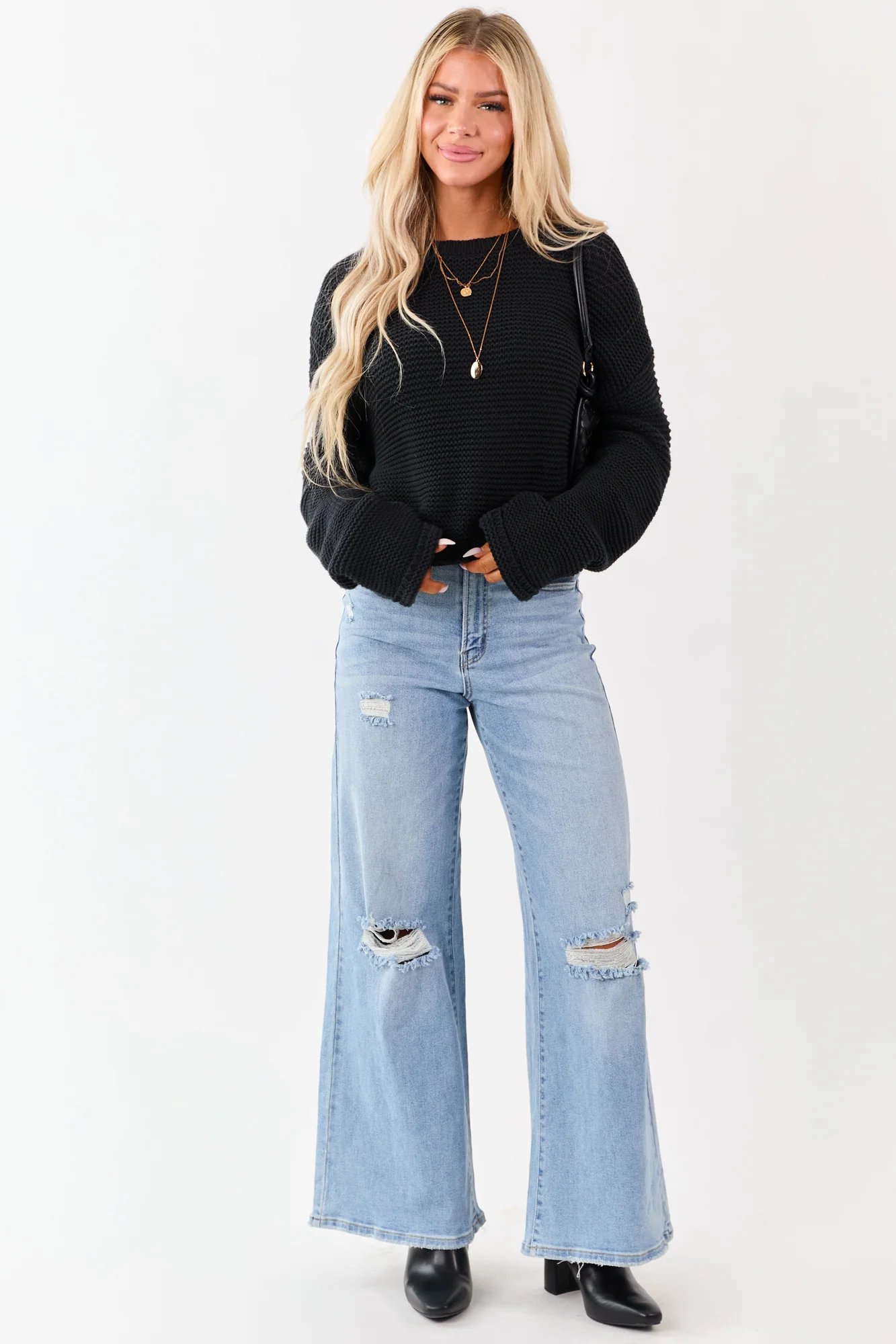 Distressed High Rise Wide Leg Light Wash Denim Jeans