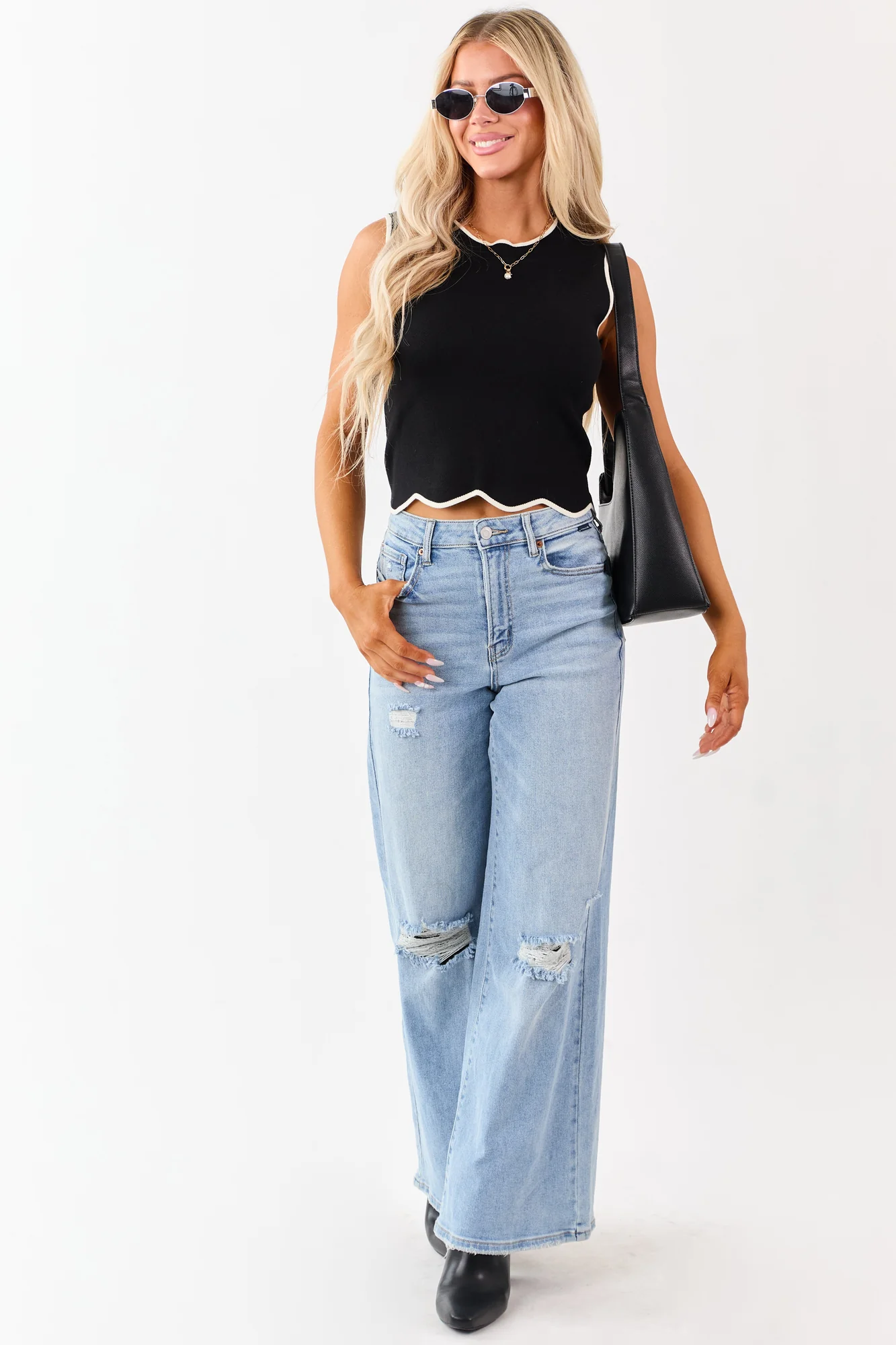 Distressed High Rise Wide Leg Light Wash Denim Jeans
