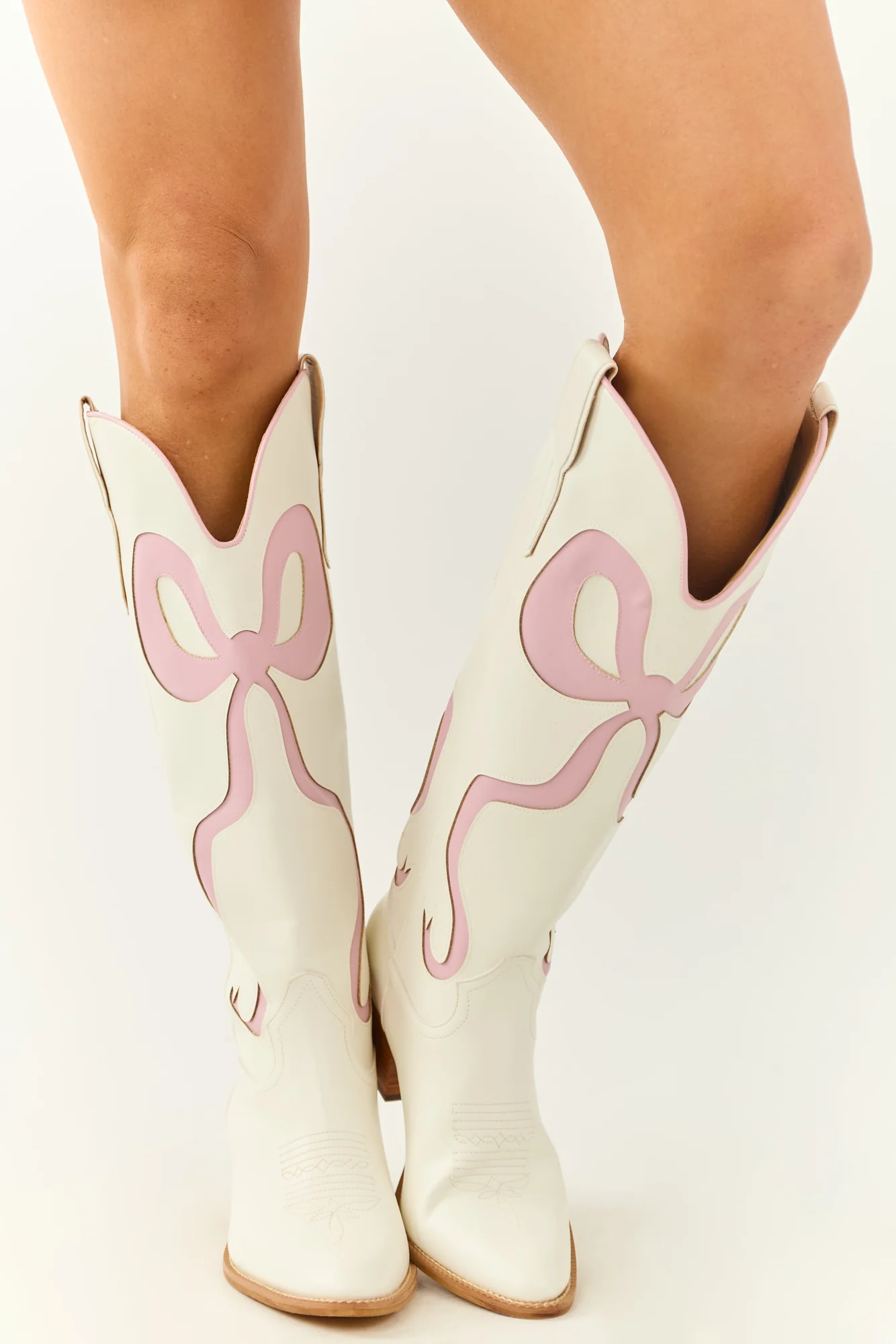 Western Ivory Knee High Heel Boots with Bow Accent
