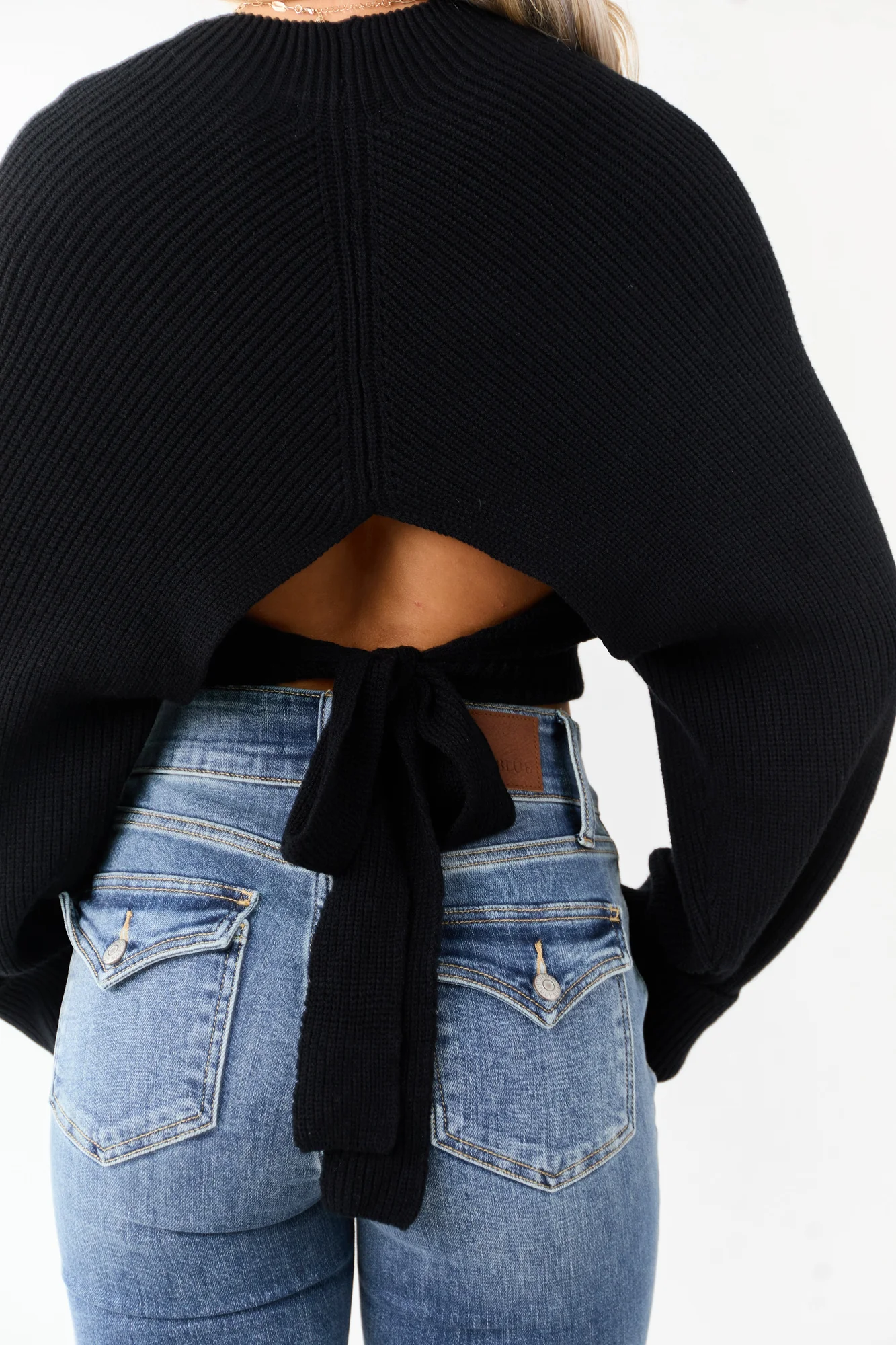 Ribbed Black Mock Neck Sweater with Back Cutout