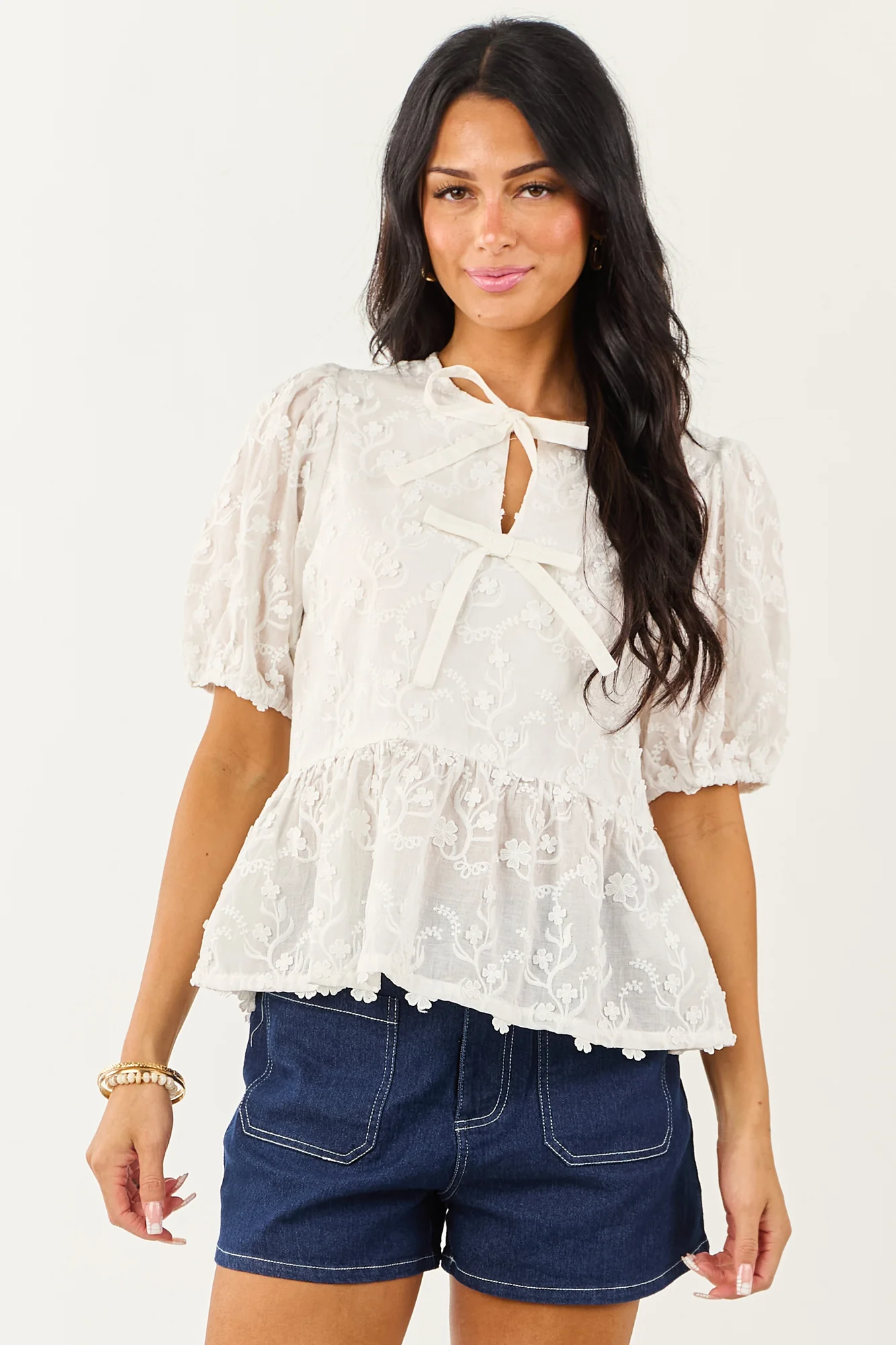 Textured Floral Tie Neck Peplum Blouse