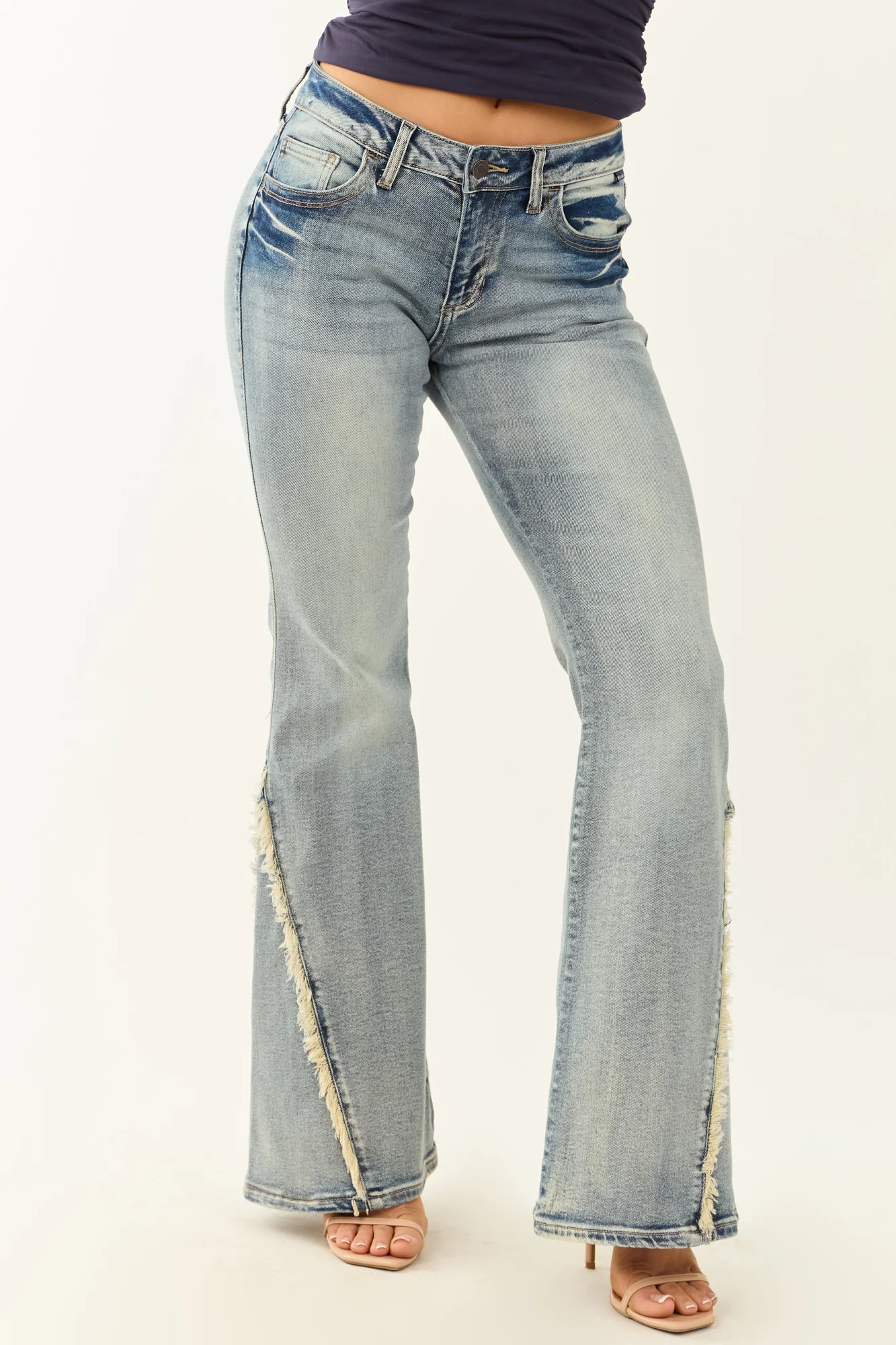 Stretchy Frayed Seam Flare Jeans in Medium Wash