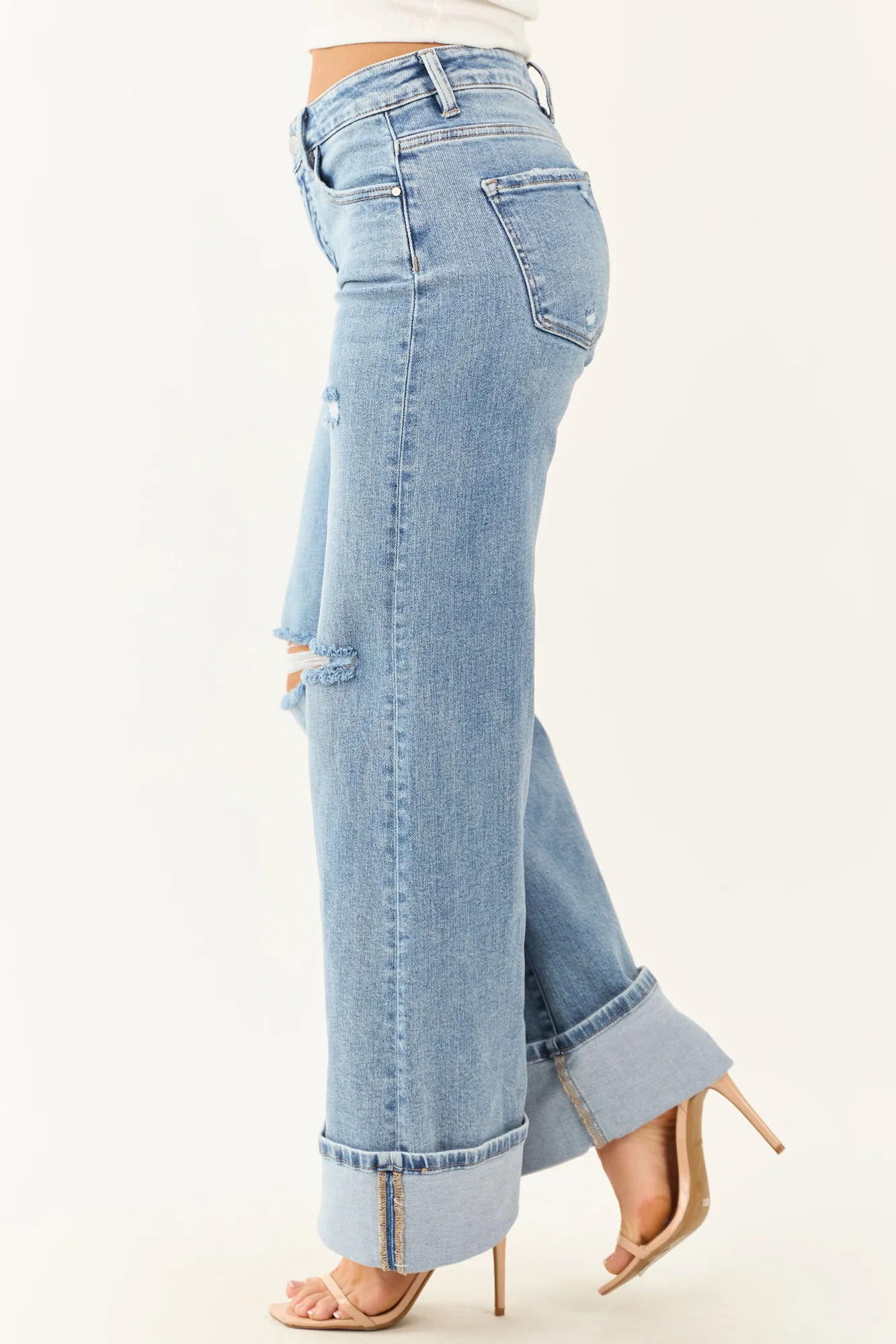 High Rise Medium Wash Wide Leg Jeans with Distressed Hem