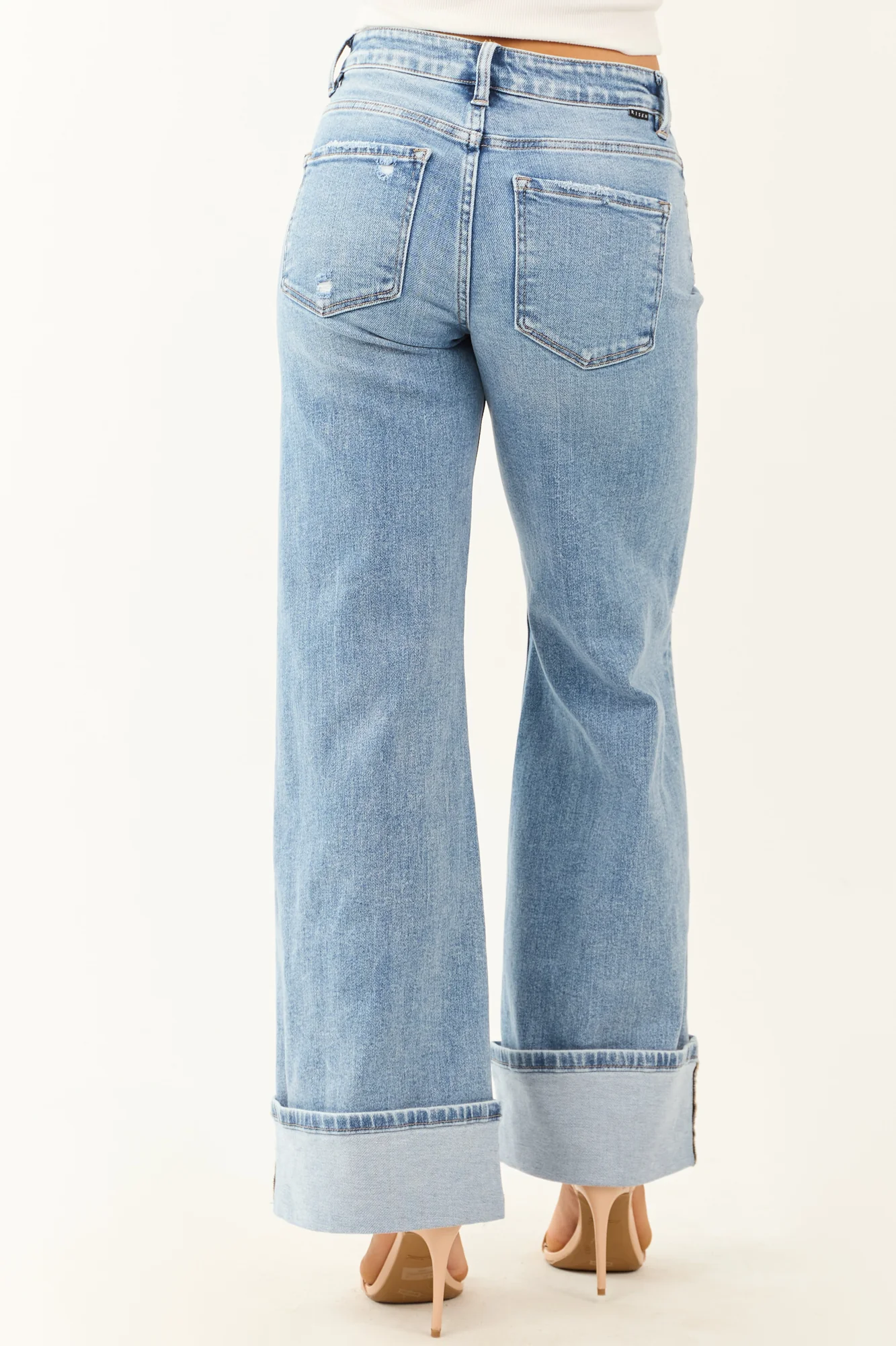 High Rise Medium Wash Wide Leg Jeans with Distressed Hem