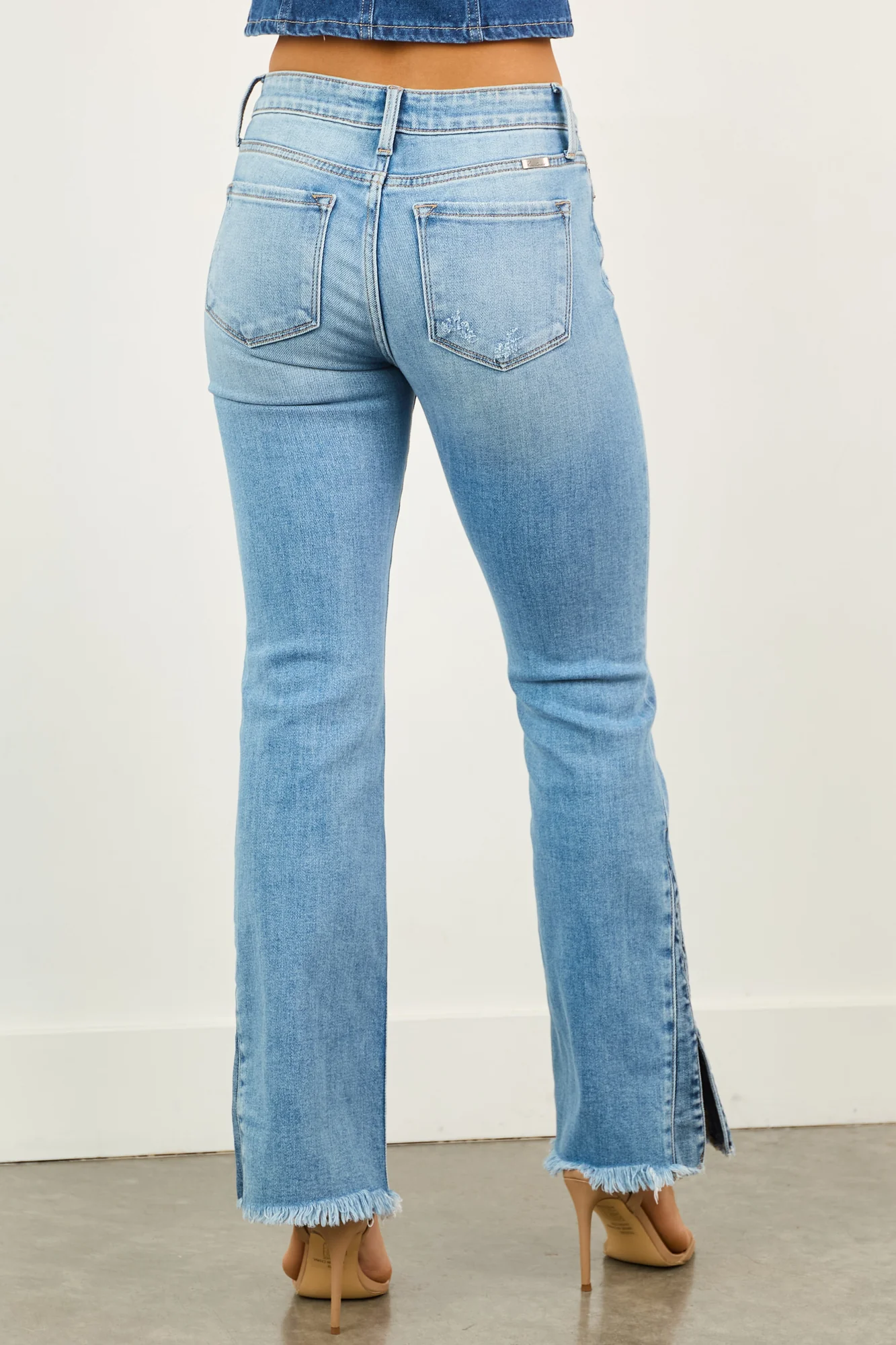 Mid Wash Stretchy Bootcut Jeans with Side Hem Slit Detail