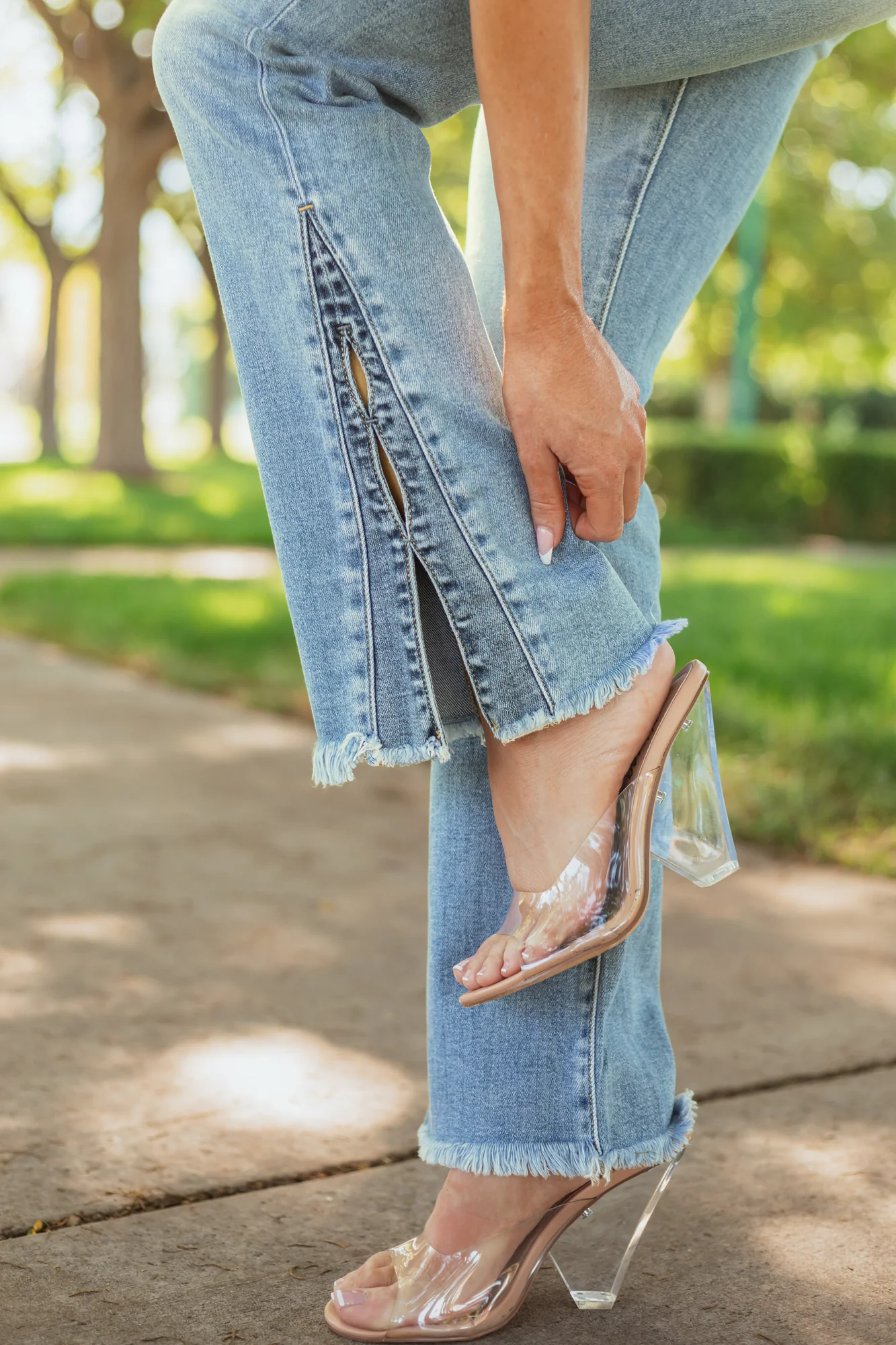 Mid Wash Stretchy Bootcut Jeans with Side Hem Slit Detail