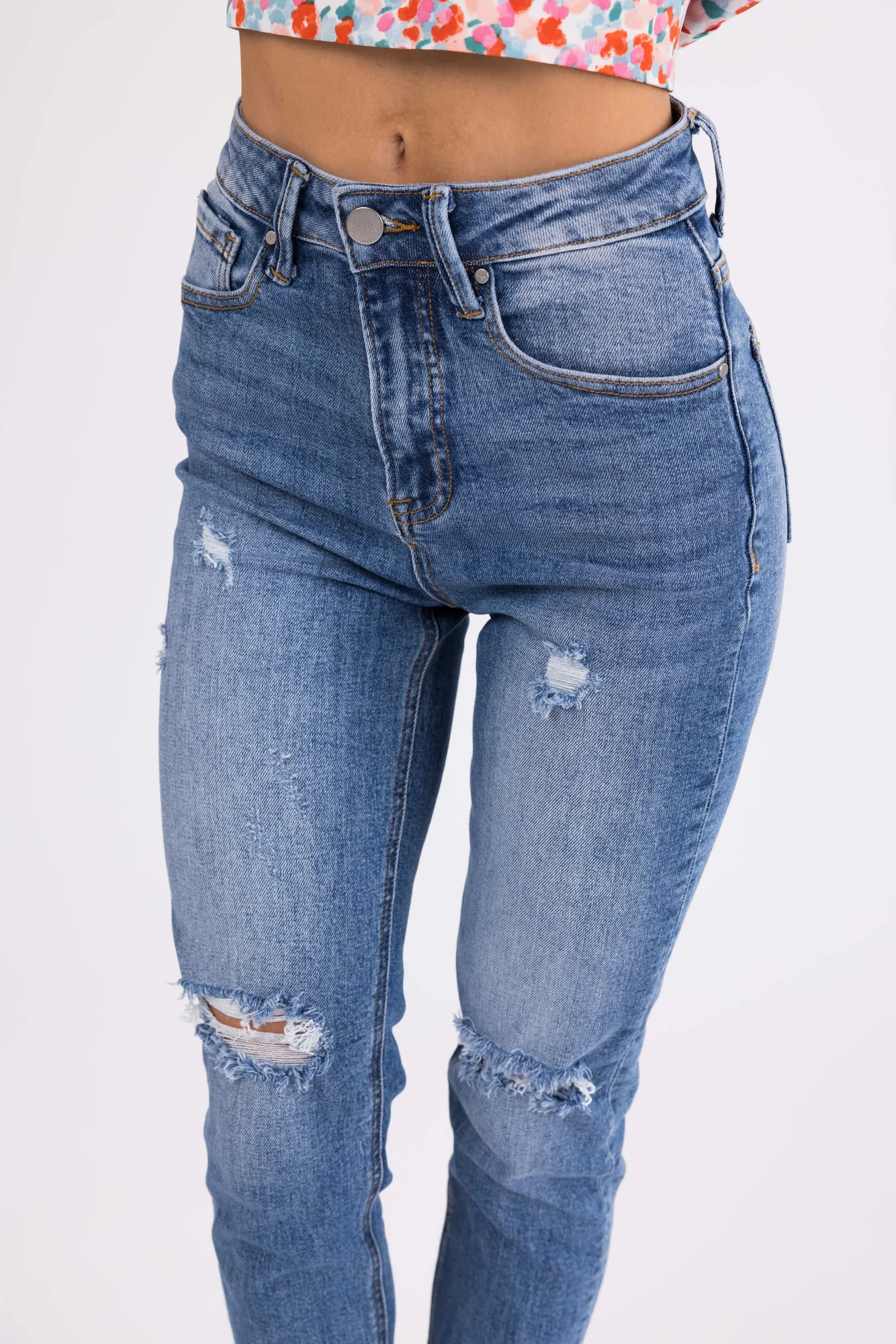 Medium Wash High Rise Skinny Jeans - Distressed Knees & Raw Hem