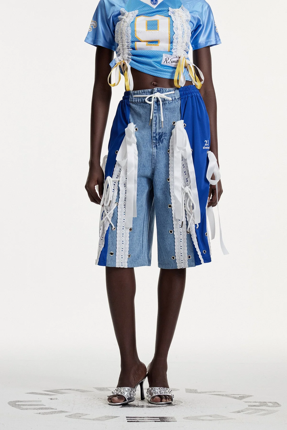 Distinctive Deconstruct Lace-Up Midi Jeans