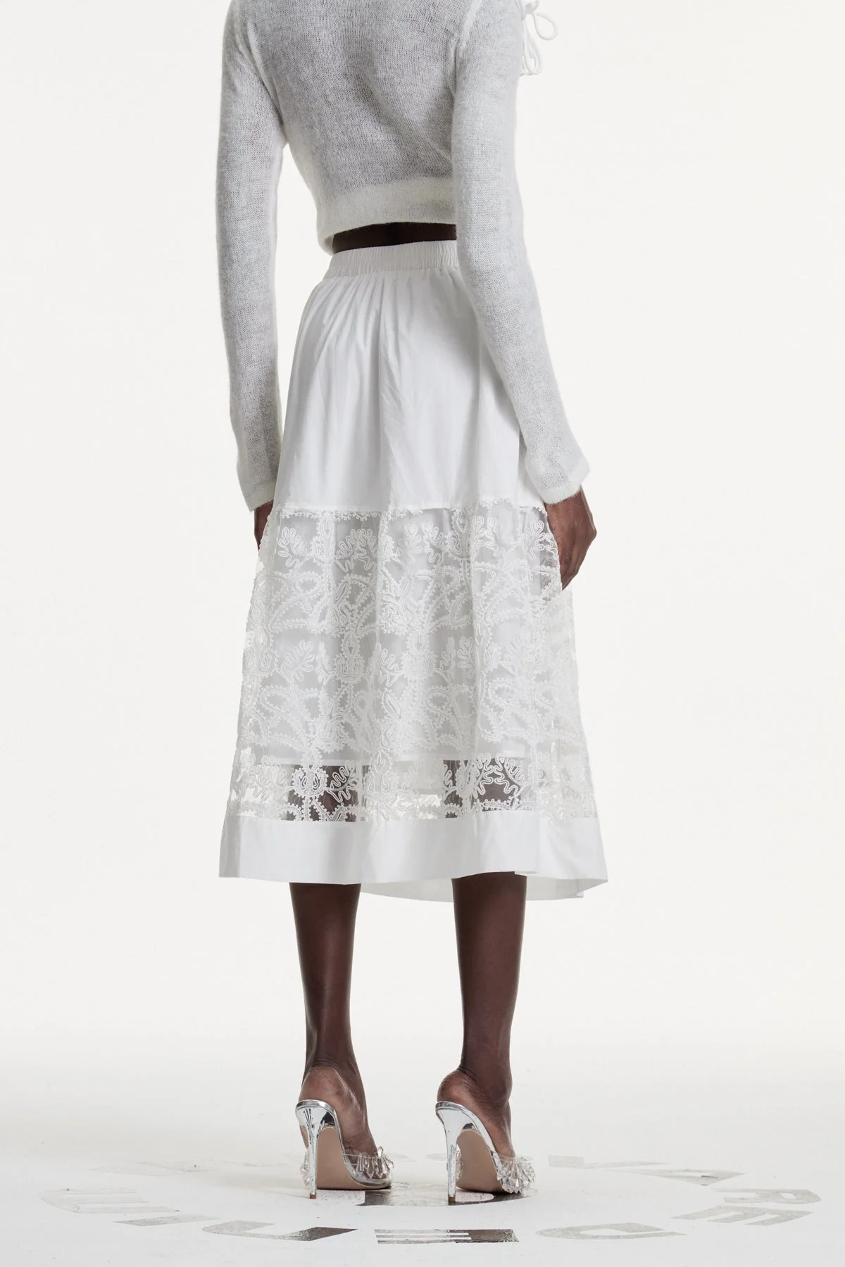 White Cutout Lace Maxi Skirt - Elegant Contemporary Design
