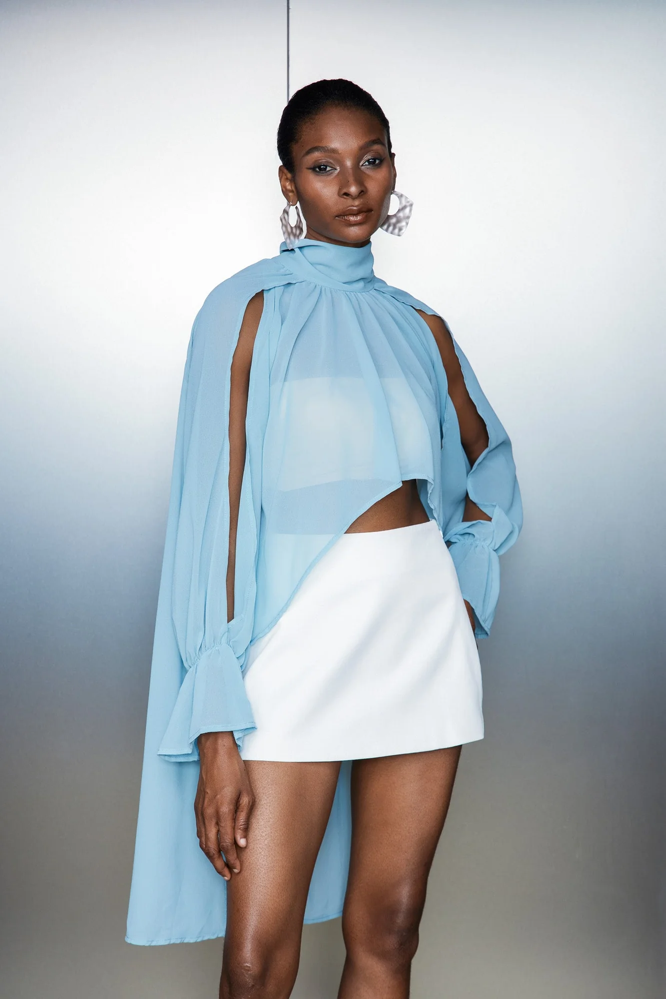 Blue Asymmetric Cutout Top: Modern Style Statement