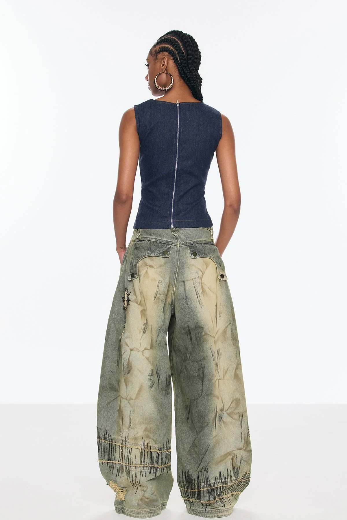 Sleeveless Denim Top with Modern Cutouts in Blue, Elegant Style