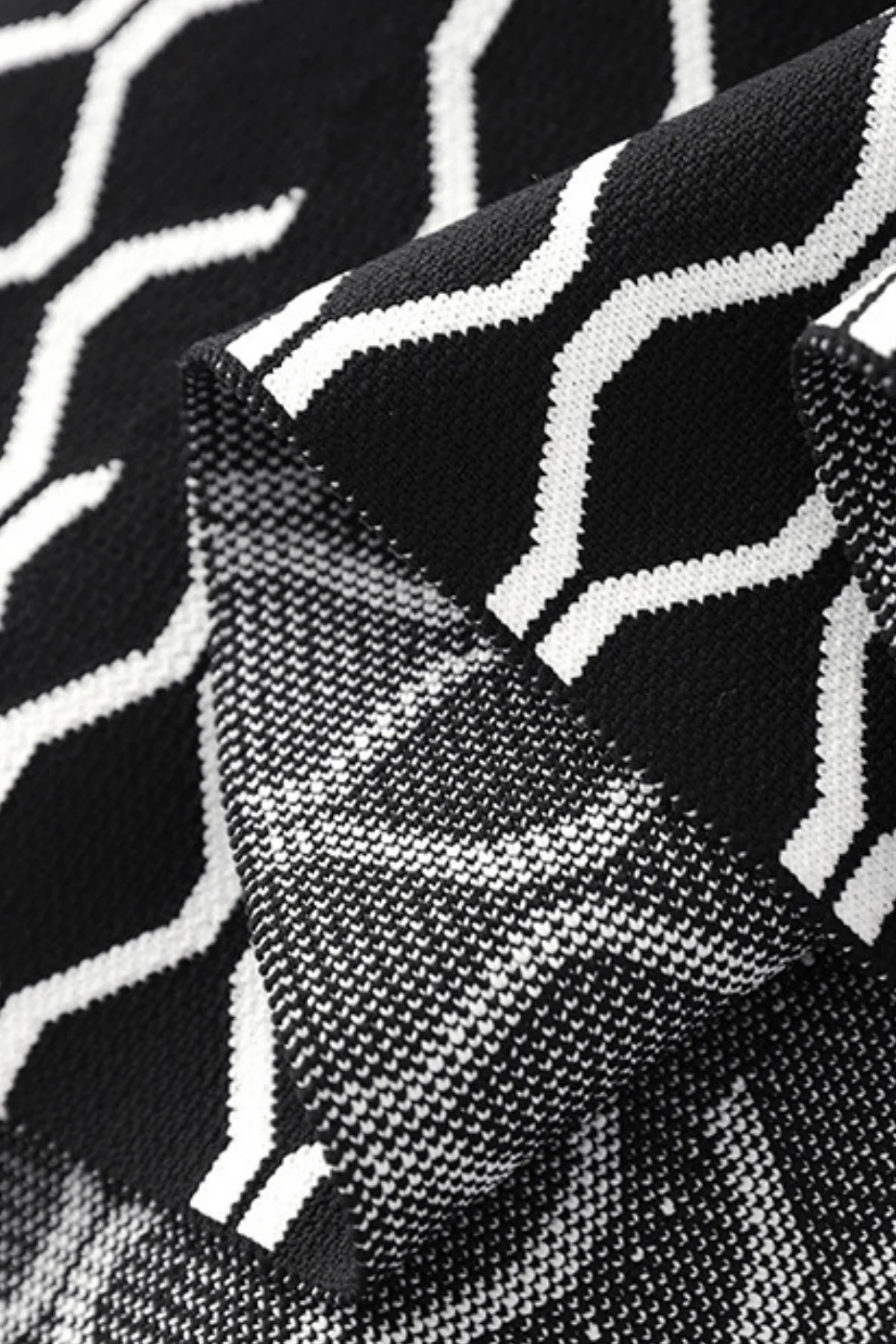 Black Grid Sleeveless Knit Mini Dress - Chic Ruffle Design