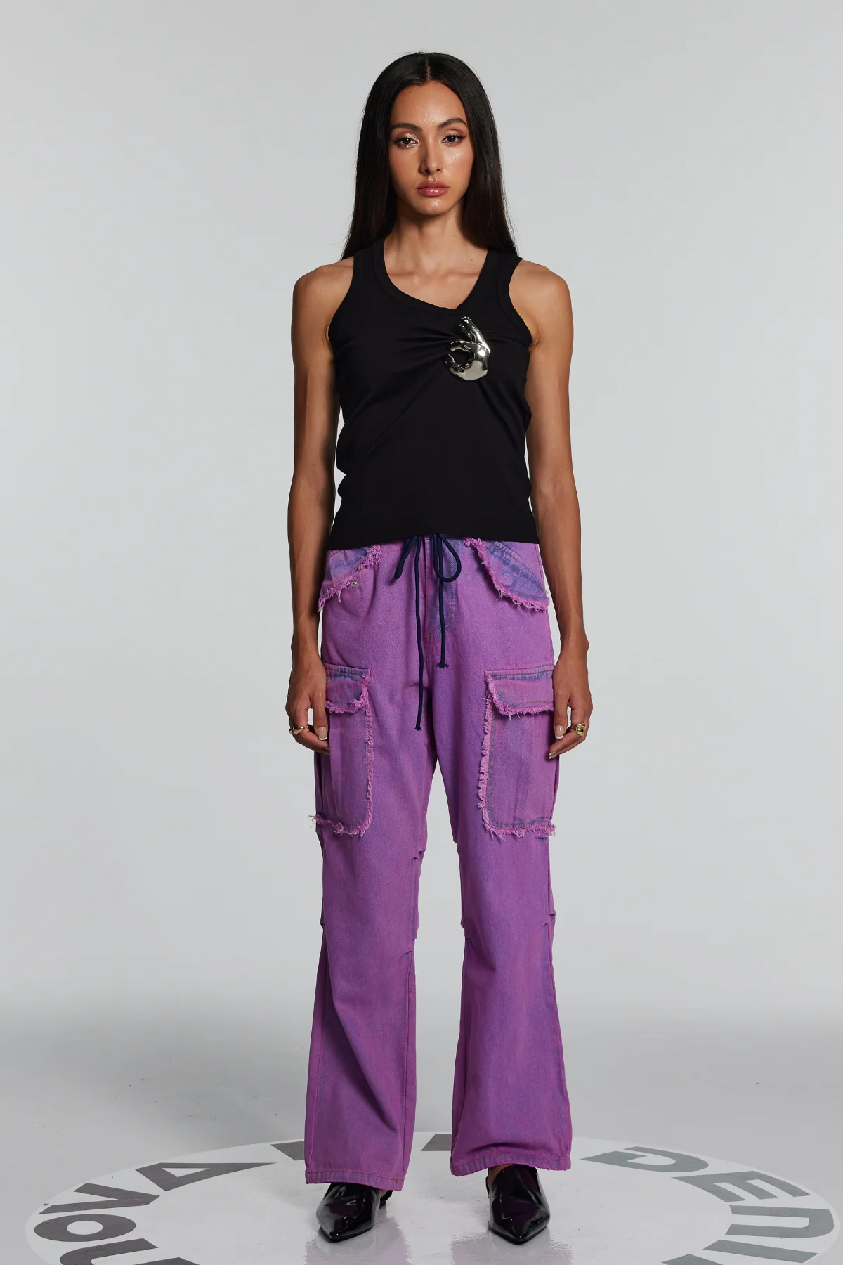 Elegant Black Sleeveless Top with Ruched Embellishments